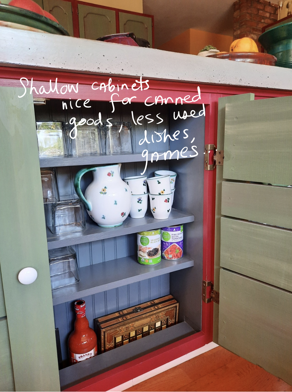 Text on image: Shallow cabinets are nice for canned goods and less used dishes, games
