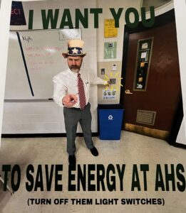 Turn off the lights poster. "I want you to save energy at AHS (turn off them light switches)"