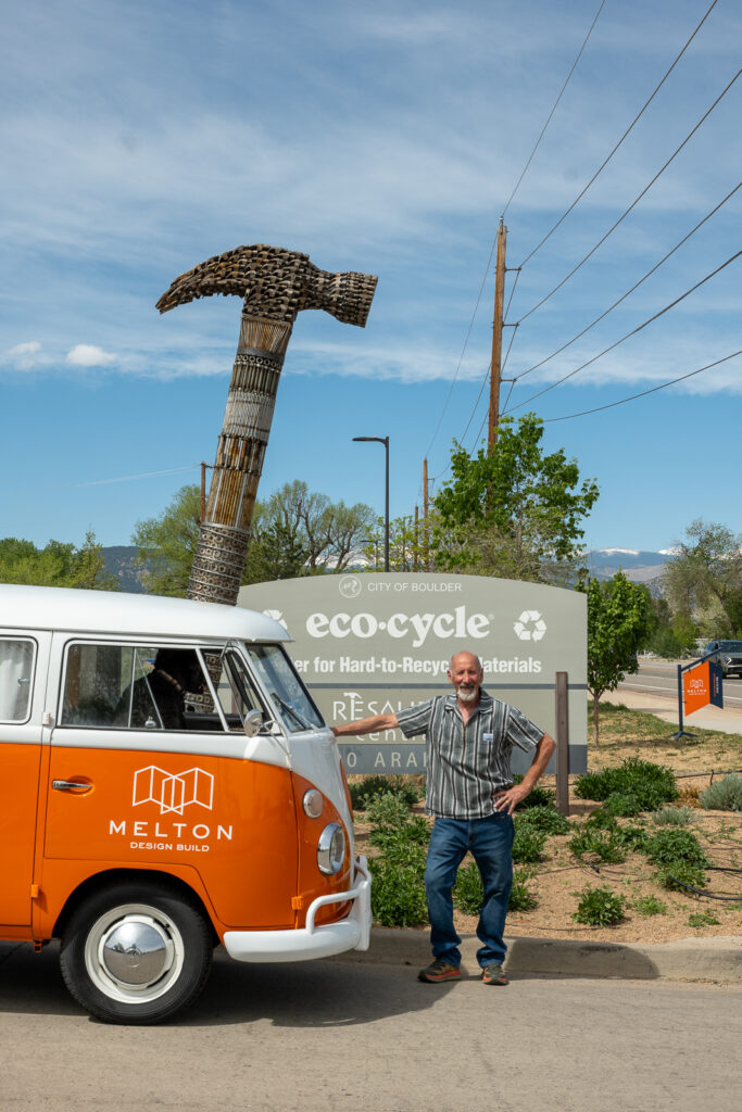 Melton Design Build's VW bus with hammer sculpture artist Mitch Levin.